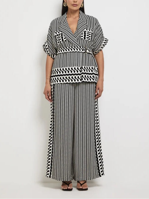 Black and white geometric print suit